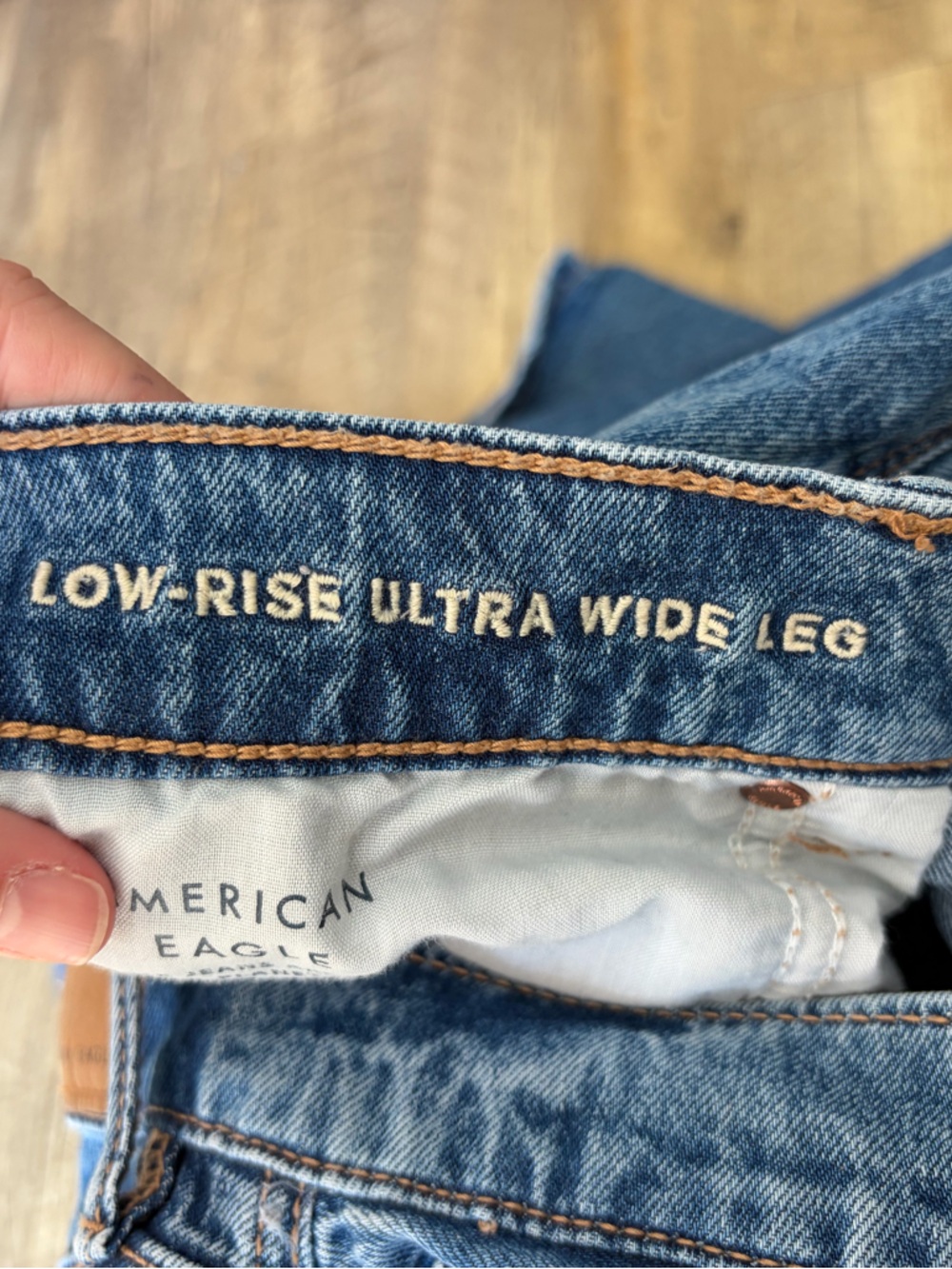 American Eagle Dreamy Drape Strigid Low-Rise Ultra Wide-Leg Jeans - Picture 5 of 12